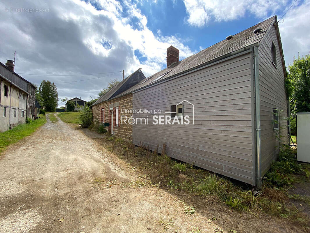 Maison à LE MENIL-DE-BRIOUZE