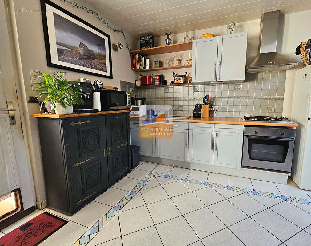 Maison à BOUGUENAIS