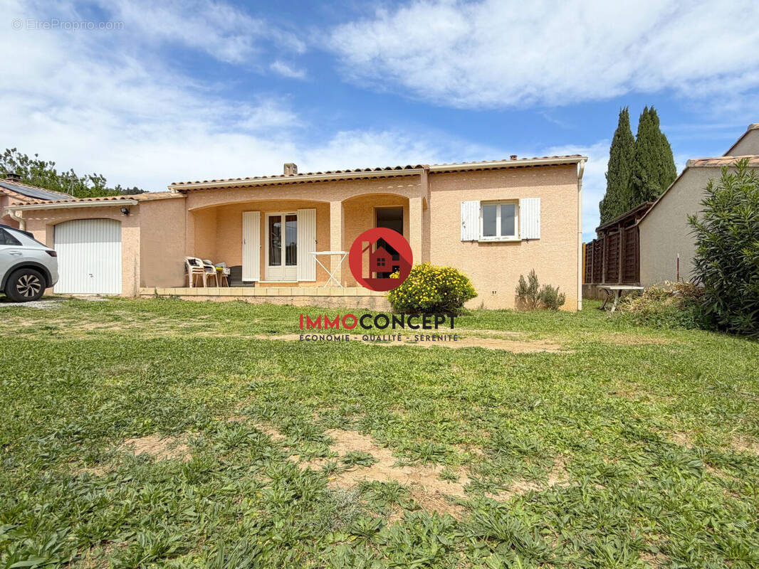 Maison à LAUDUN-L'ARDOISE