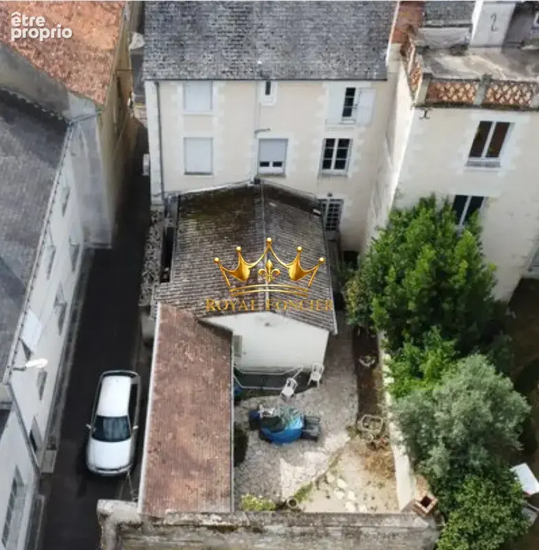 Immeuble avec local commercial + maison d'hab 