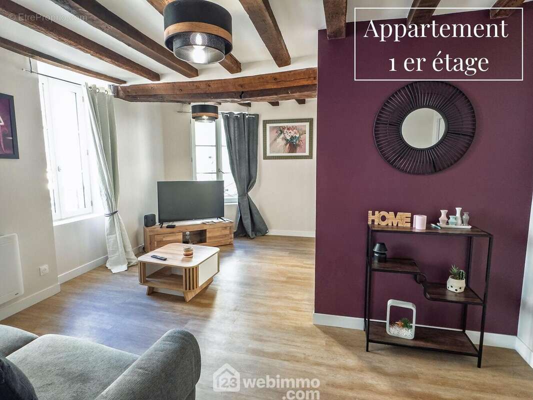 Au 1er étage vous découvrirez un lumineux... - Appartement à LAVAL