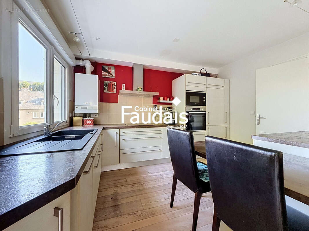 Cuisine via séjour - Appartement à SAINT-LO