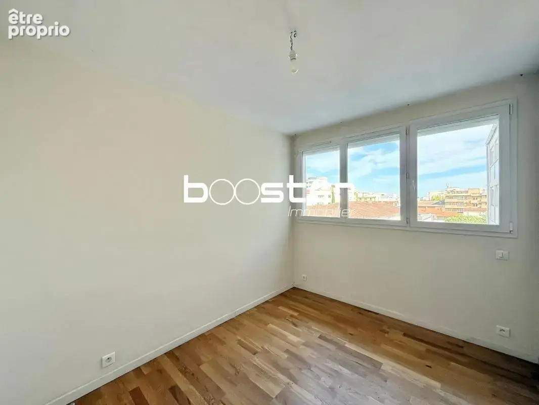Coeur Patte d'Oie - Appartement 3 Pièces traversant avec deux balcons, garage et cave - photo 5