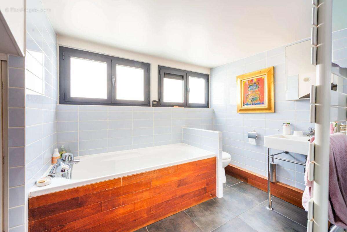 Demeure de  6 pièce(s) de 217m2 au sol - Nanterre Ville - photo 9