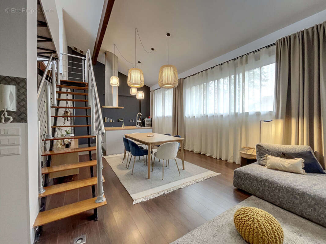 Duplex d'exception avec terrasse de 25m², spa et volumes rares - photo 8