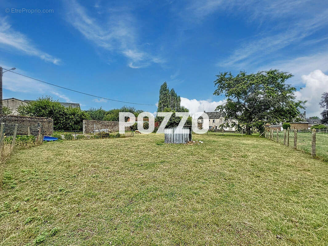 A Vendre - Saint Hilaire Du Harcouet - Maison 7 pièce(s) 160 m² - Centre-ville - photo 17