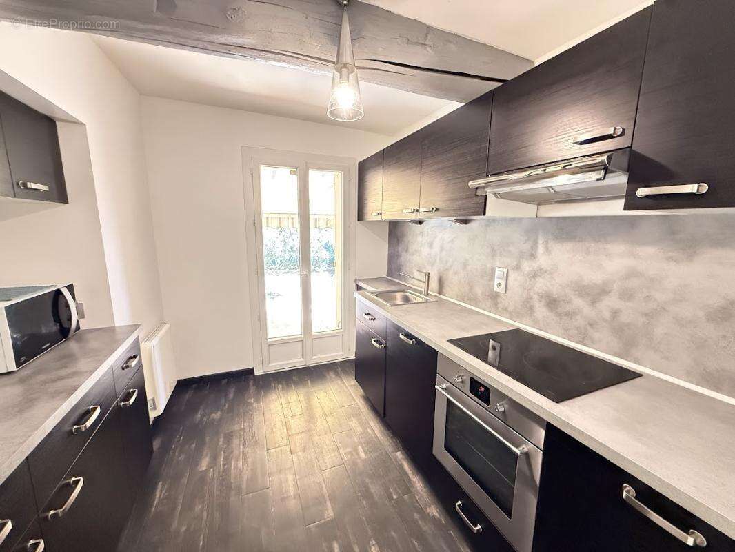 Appartement T2 avec jardin - photo 6