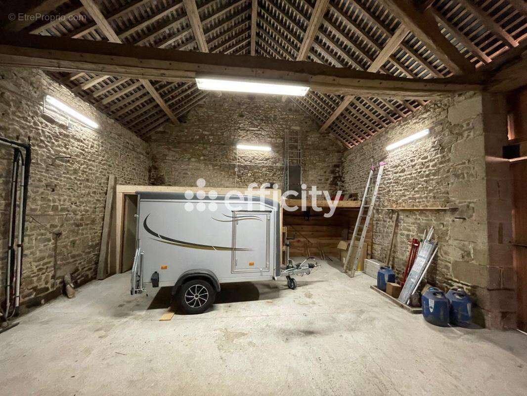 Maison à CONDE-SUR-SARTHE