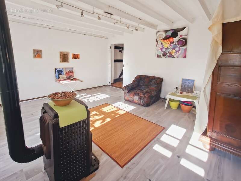 Charmante maison de trois chambres - photo 3
