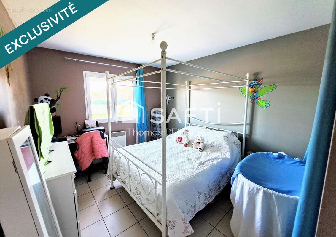 Photo 4 - Maison à BUSSAC-FORET