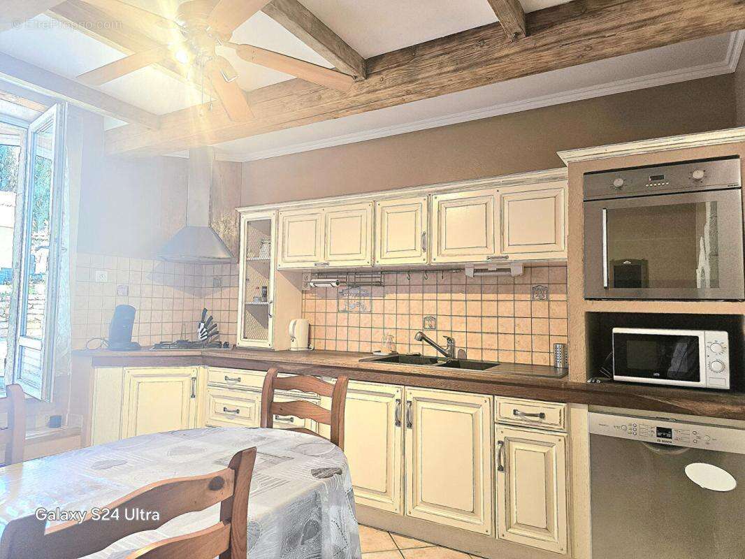 Mas en pierre, composé d'un ensemble immobilier de 10 pièces sur plus de 1210 m² de terrain à SAINT GERVAIS 30200 - photo 7