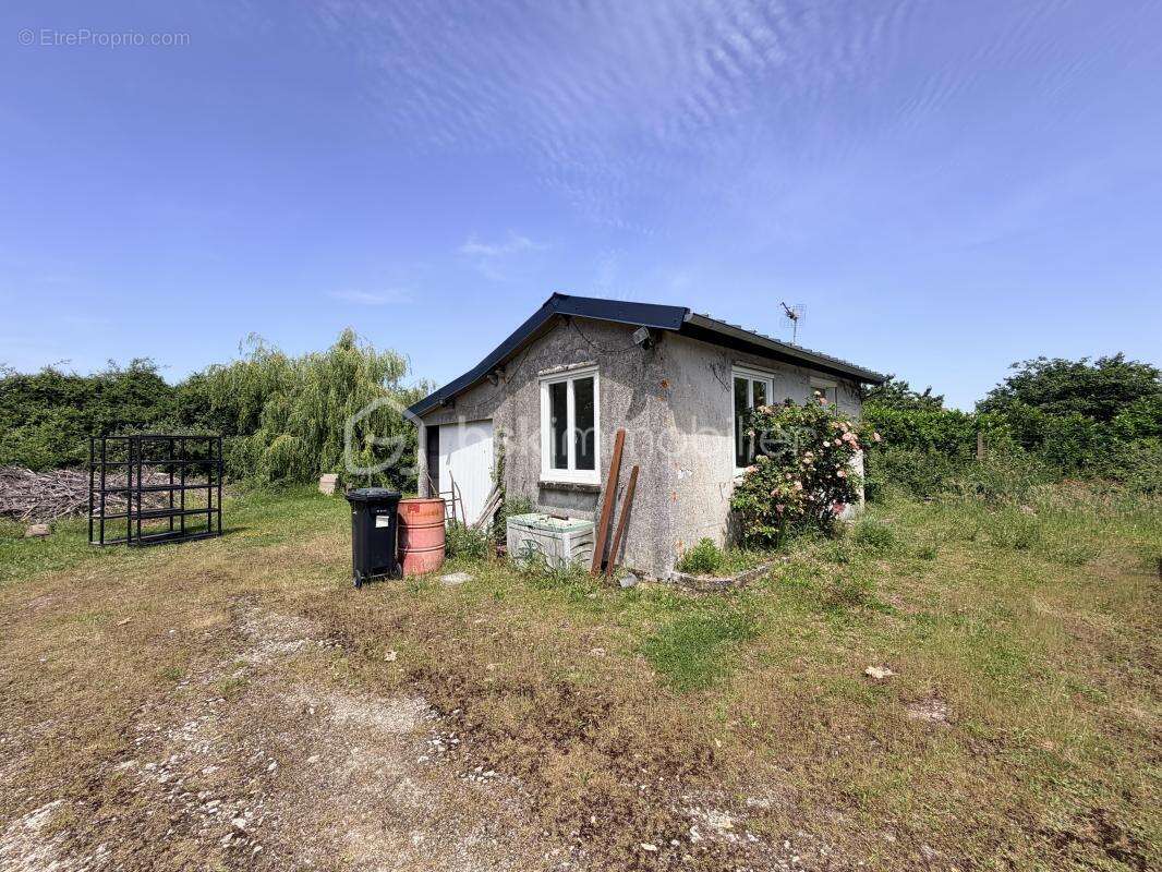 Maison sur sous sol à rénover sur un terrain de 5 761m² - photo 4