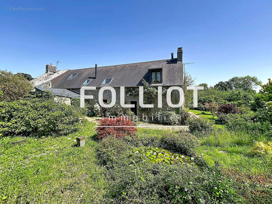 Charmante maison en pierre à vendre à Bacilly - 7 pièces, 110m² - photo 14