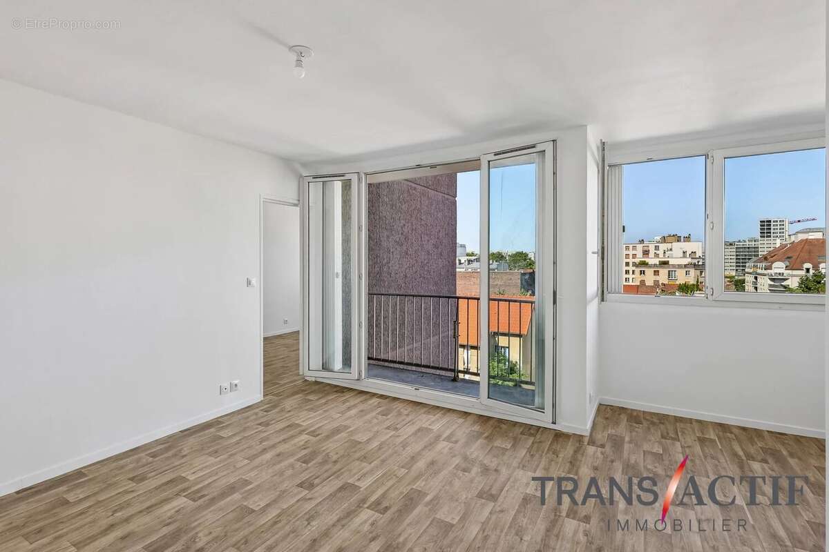 À vendre – Superbe 4 pièces de 77 m² avec balcon, box et cave - photo 2