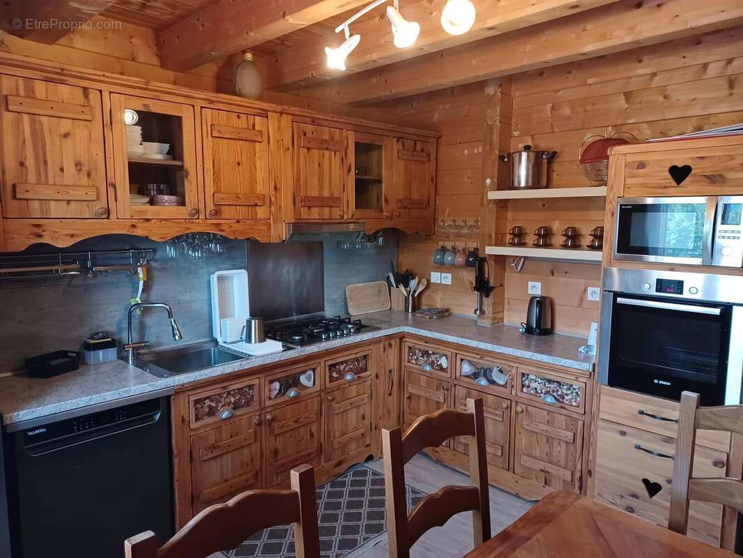 PREMANON : Chalet avec 2 logements et grand garge - photo 6