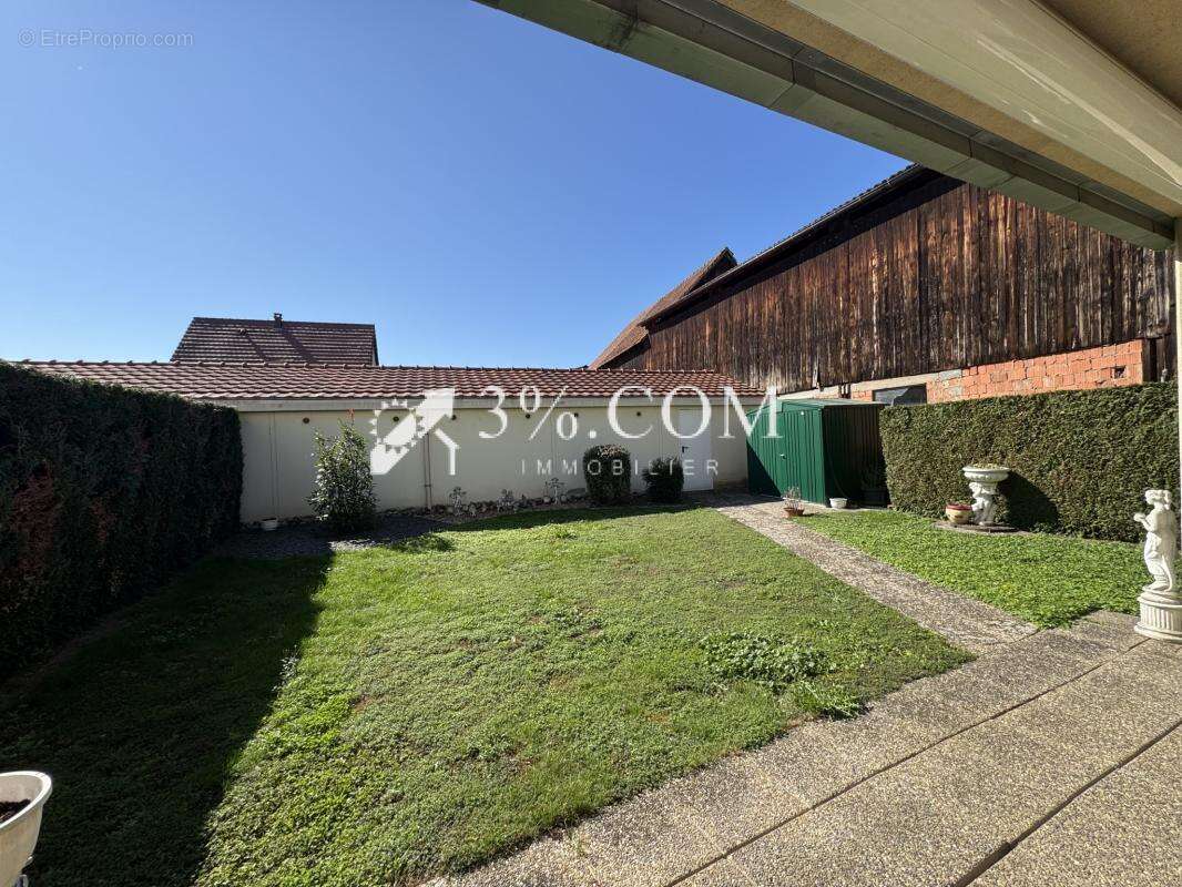 3%COM Beau F3  avec jardin de 134m2 + double garage - photo 8
