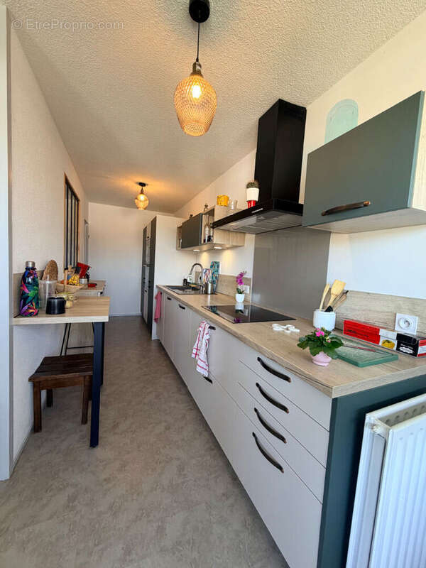 Appartement Aurillac de type 3 au dernier étage avec ascenseur et stationnement - photo 4