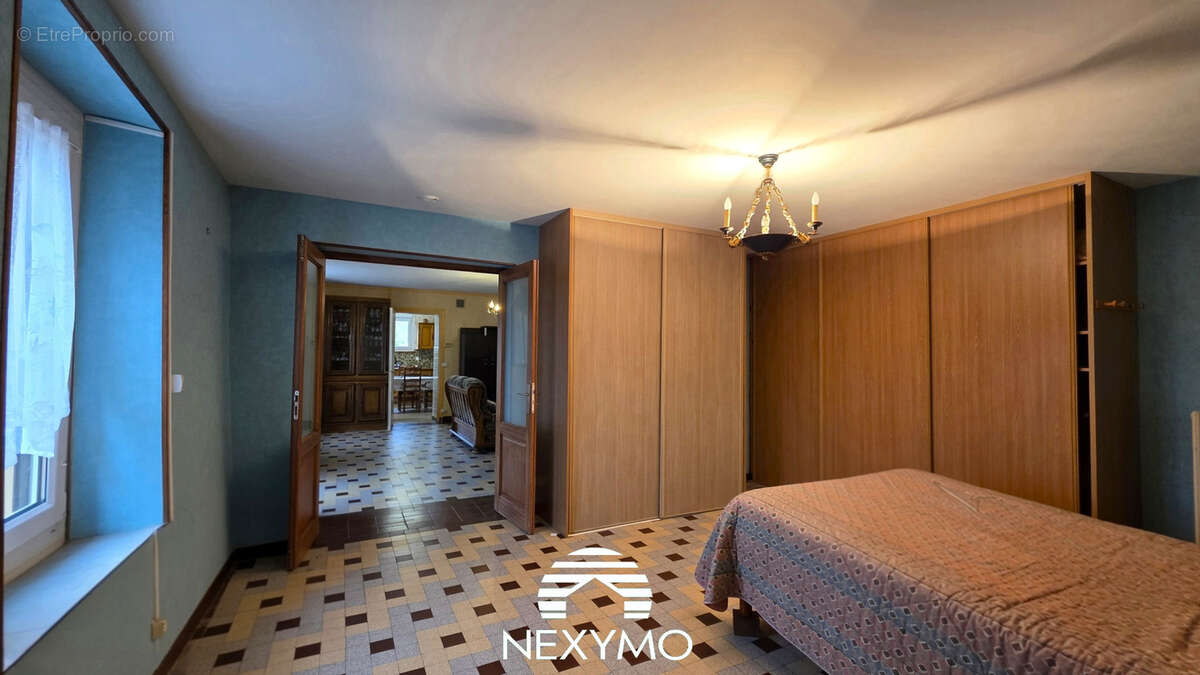 Maison à PARIGNE-L'EVEQUE