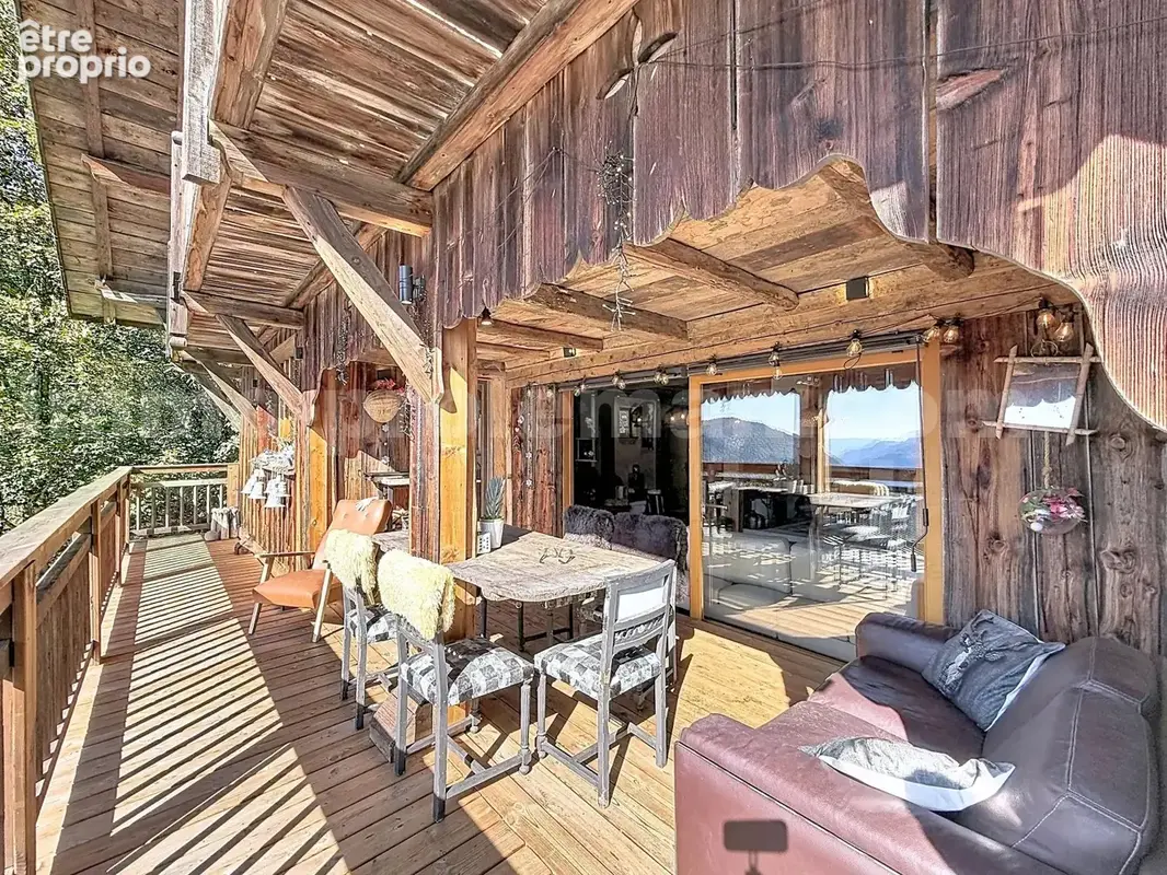 Appartement_T4_Araches_la_frasse_les_carroz_terrasse_balcon_belle_superficie_proche_prox_frontière_Suisse_direction_GENEVE_autoroutes_investissement_locatif_vente_vue_séjour_cuisine_ouverte_calme_nature
