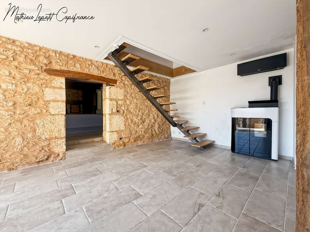 Aux portes de Périgueux – Authentique longère en pierre du XIXᵉ siècle 210 M²- T7 – DPE B – Terrain clos de 1,14 hectare-dépenda - photo 11
