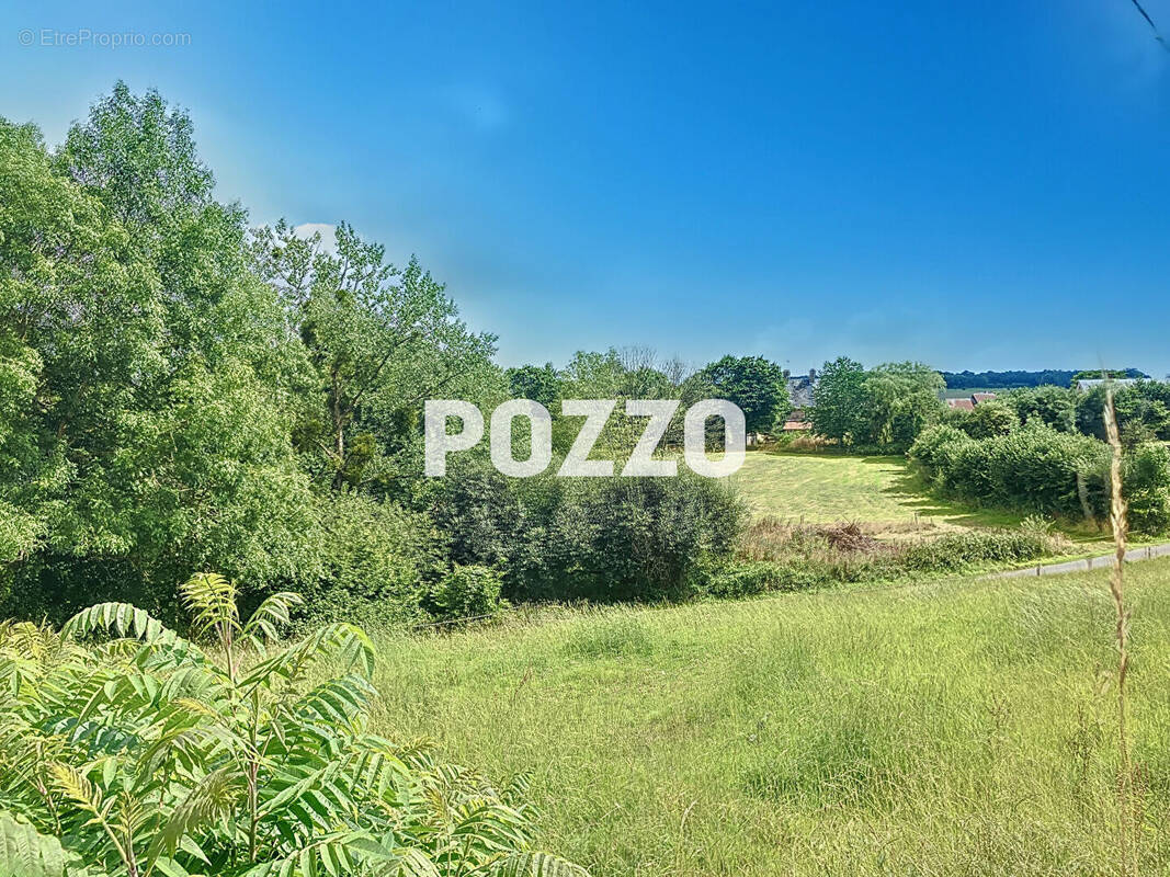 Terrain à TESSY-SUR-VIRE