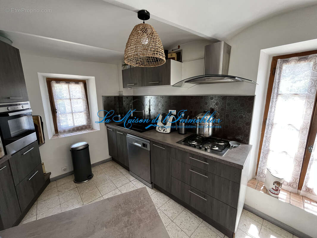 A proximité de Gagnières au calme maison de village en pierre de type F3 avec 653m2 de terrain. - photo 4