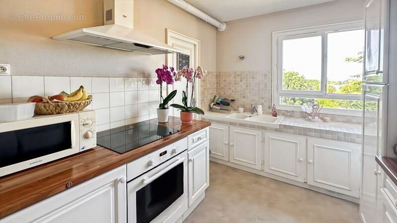 Appartement à vendre T4 de 76 m² avec balcon, cave et parking - BERGERAC (24) - photo 9