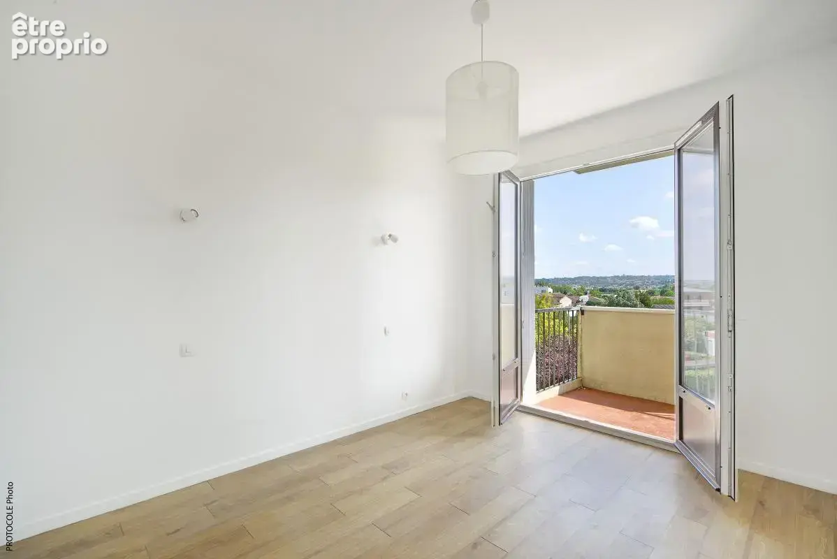 Appart T3 traversant 59 m², deux terrasses, cave et parking - photo 13