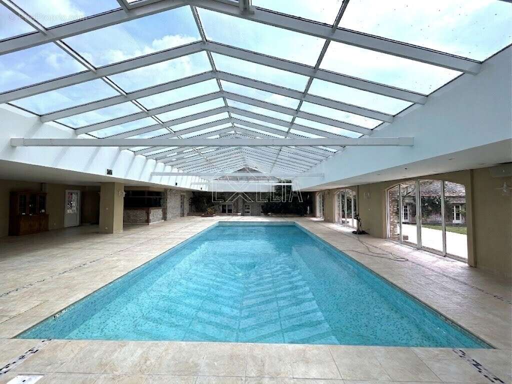 Propriété de caractère 12 pièces 638 m² avec piscine, dépendances équestres et parc de 1,4 ha à Villegats - photo 16