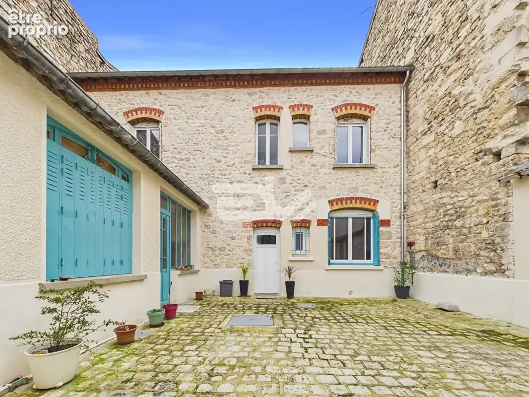 Immeuble de rapport avec local commercial et deux appartements - Environ 200 m²  -Fort potentiel - photo 5