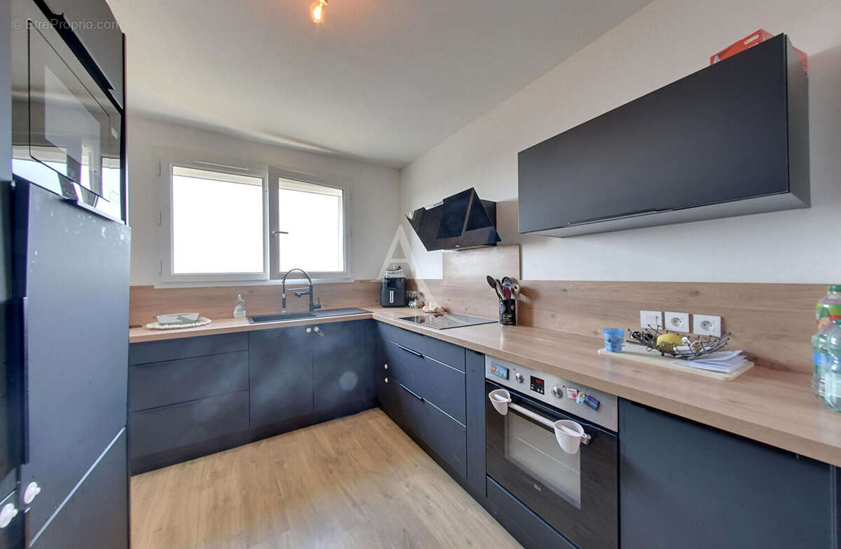 Superbe 4 pièces de 79 m² avec balcon, cuisine moderne et cave - photo 5