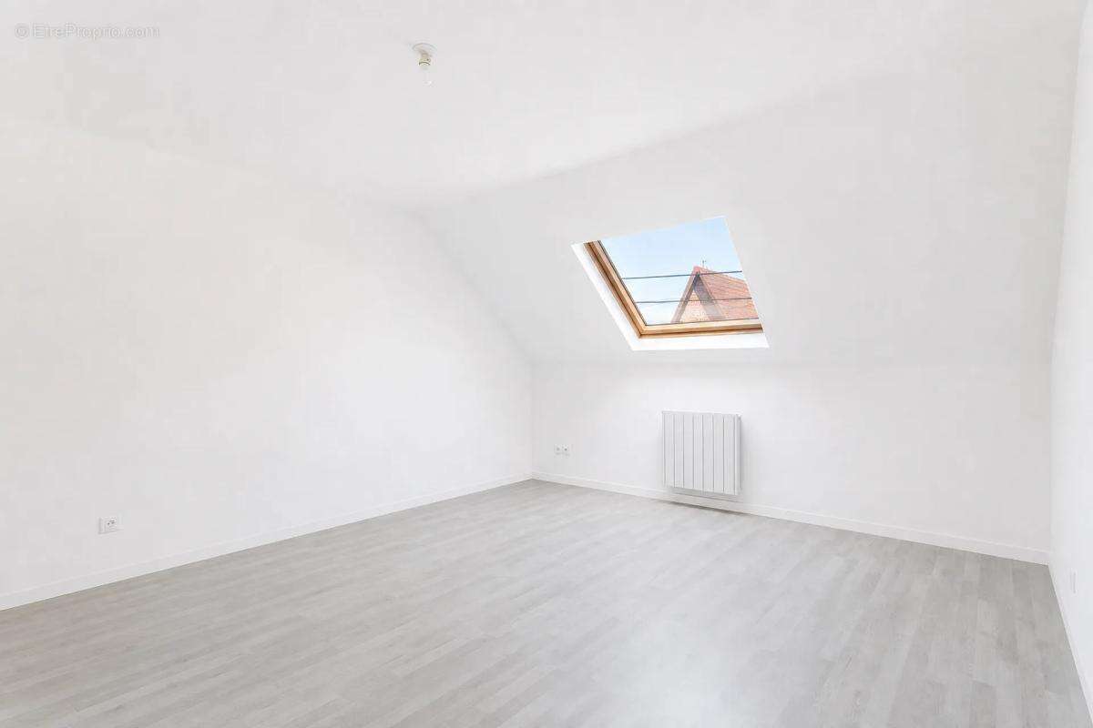 Maison de 4 pièces de 101 m² à Bauvin - photo 7
