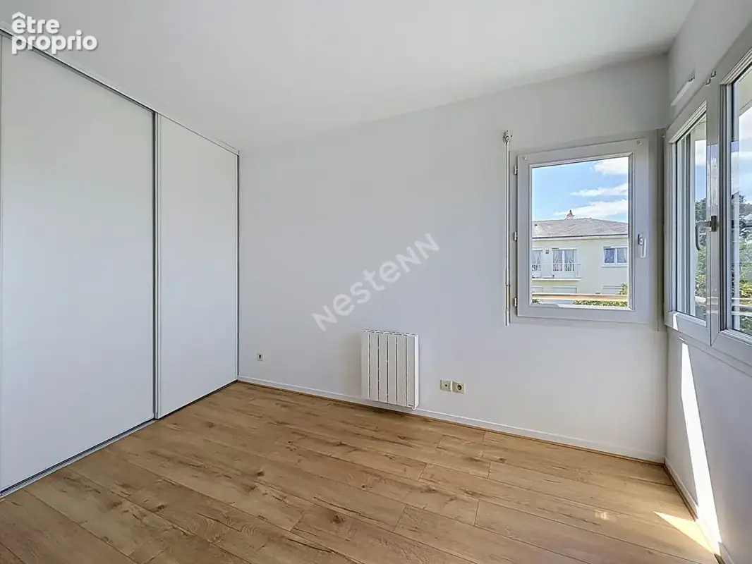 Appartement 1 chambre - Proximité tramway - Sans travaux et parking - photo 5