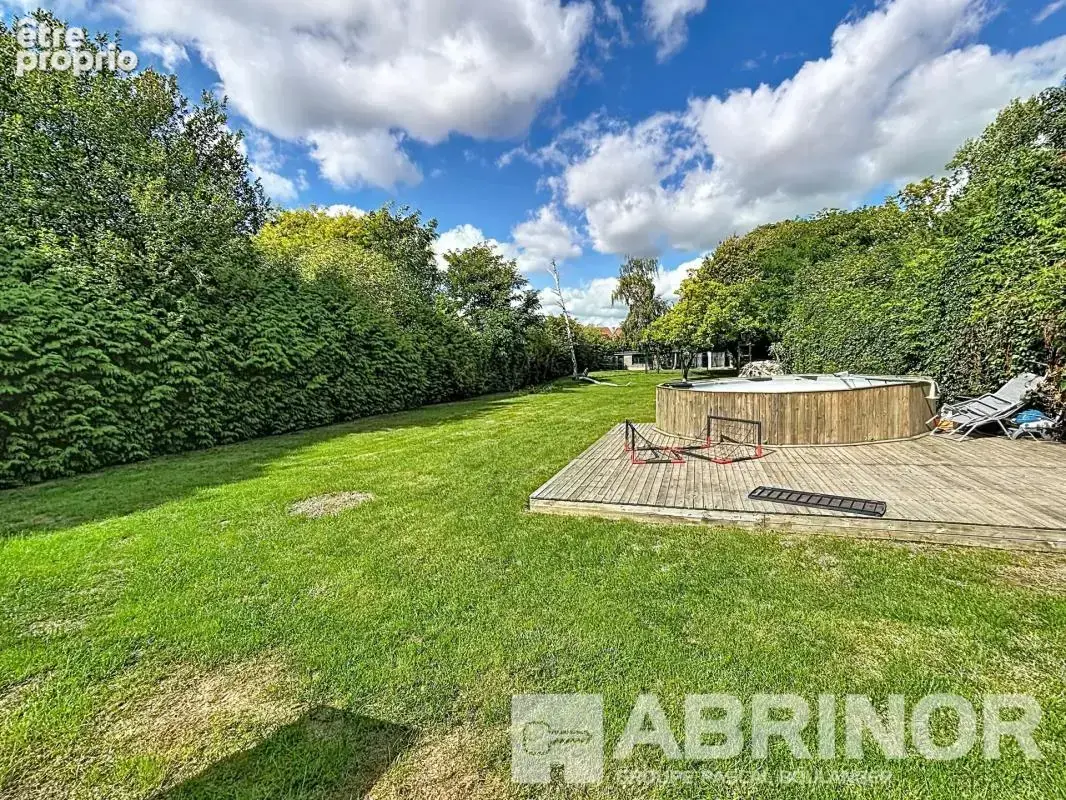 Maison de famille individuelle bâtie sur 1770m² - photo 6