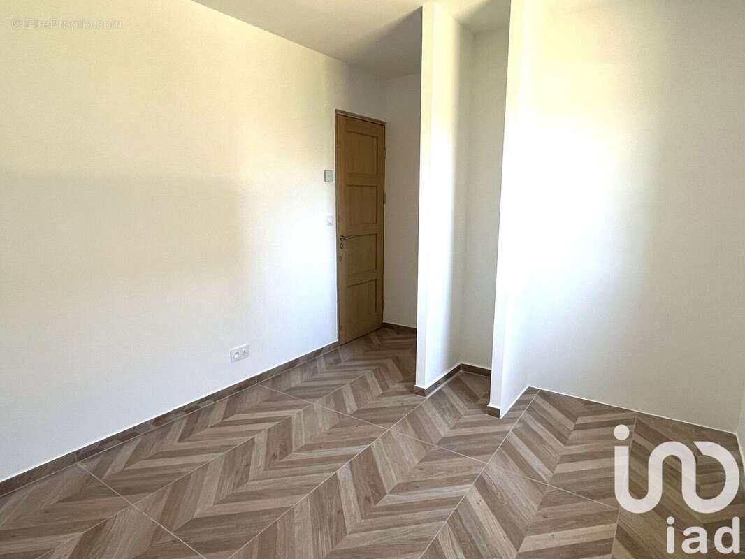 Photo 5 - Maison à LAUDUN-L&#039;ARDOISE