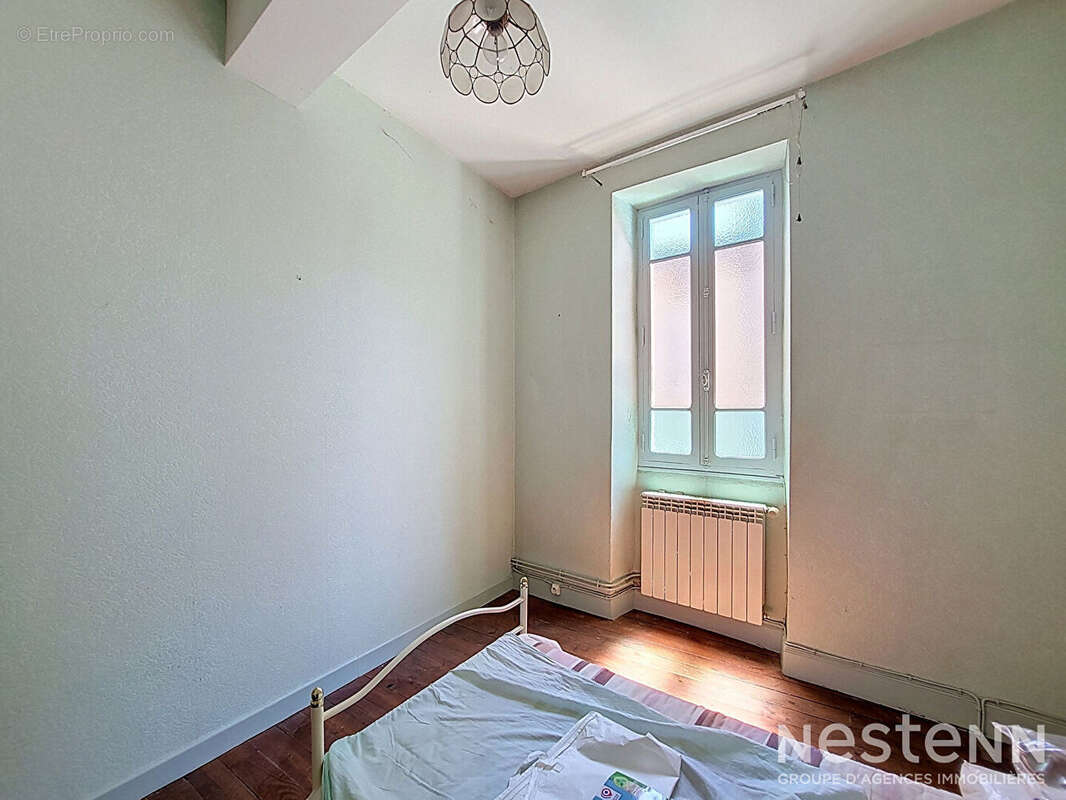 A Vendre Maison en pierre de 118m² avec quatre pièces et terrasse couverte à Condom - photo 11