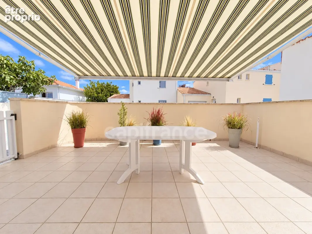 Maison à vendre 4 pièces SAINT GEORGES DE DIDONNE (17) - Terrasses -garage - photo 5