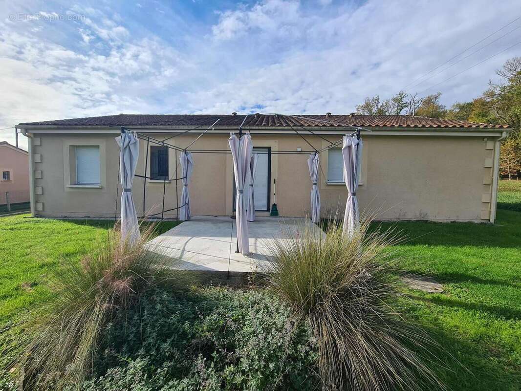 Photo 2 - Maison à SAINT-ASTIER