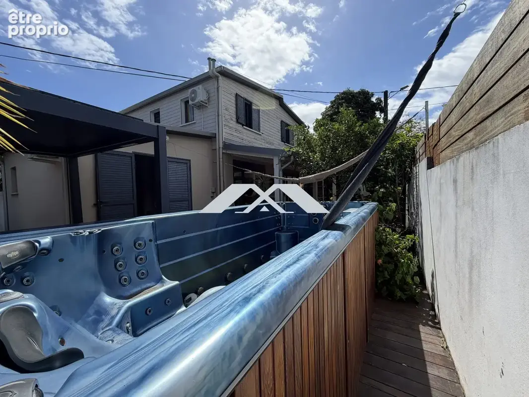 Maison 5 pièces 114 m² à vendre à Saint-Pierre (97410) - photo 6