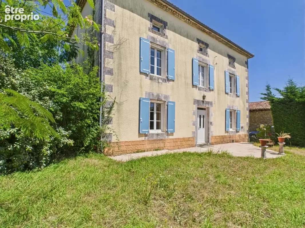 Propriété familiale avec potentiel - photo 1