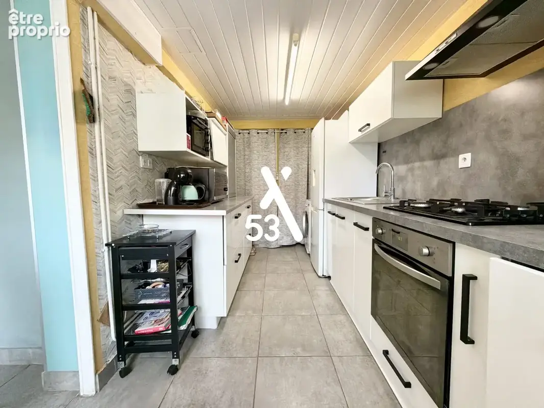 Maison 97 m² à Longuenesse  - photo 4