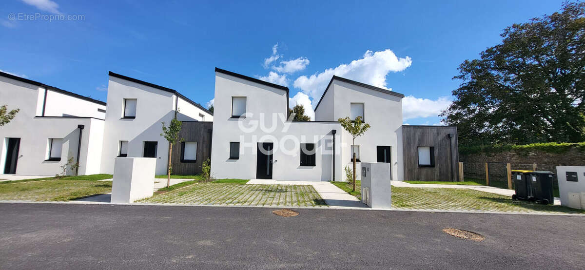 Maison à GRAND-CHAMP