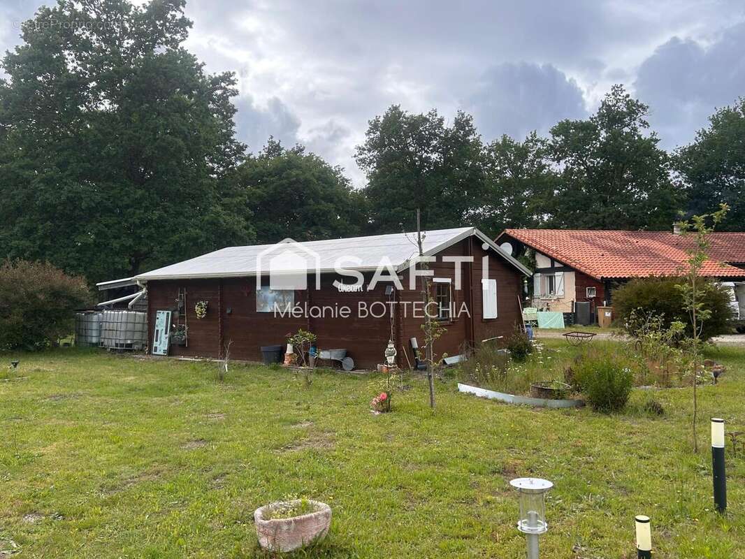 Photo 2 - Maison à SAUGNACQ-ET-MURET