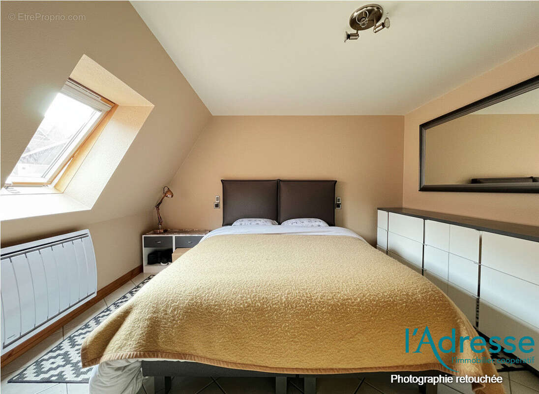 Appartement  en duplex F4 - avec stationnements et jardin - photo 8