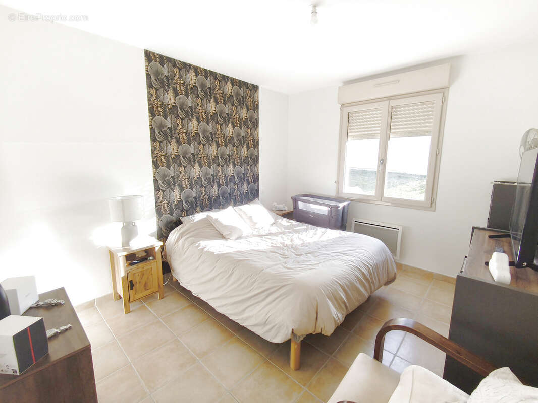 Maison à PARIGNE-L'EVEQUE