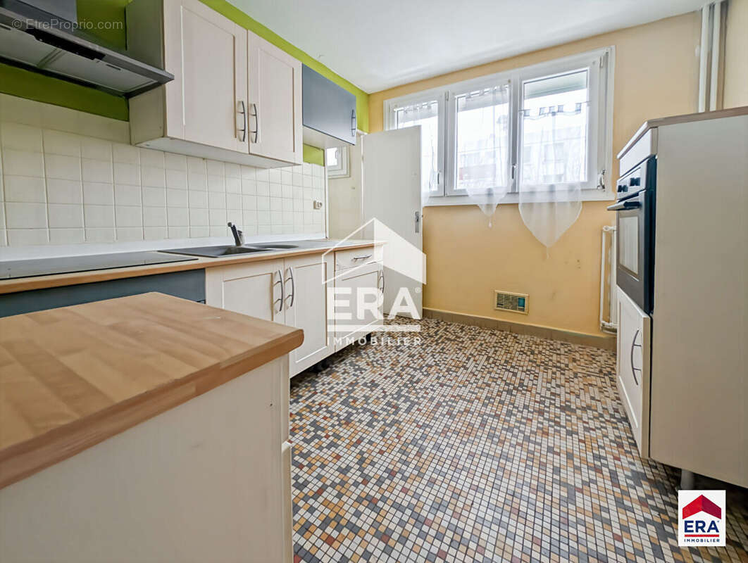 Appartement T3 - 68 m² - 2 chambres - Cave - photo 3