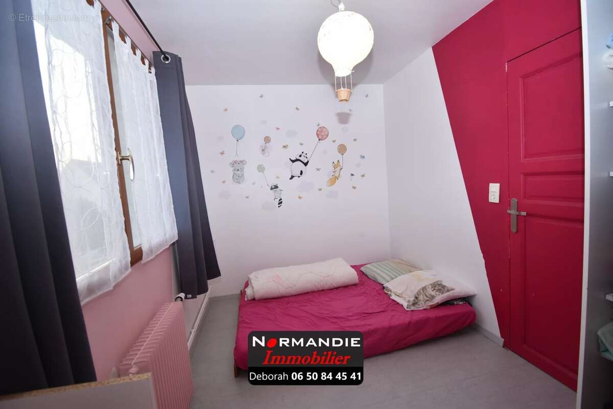 Maison familiale 115 m² –  3 chambres + 1 chambre d'enfant ou bureau – Jardin clos – Secteur recherché de Maromme - photo 16