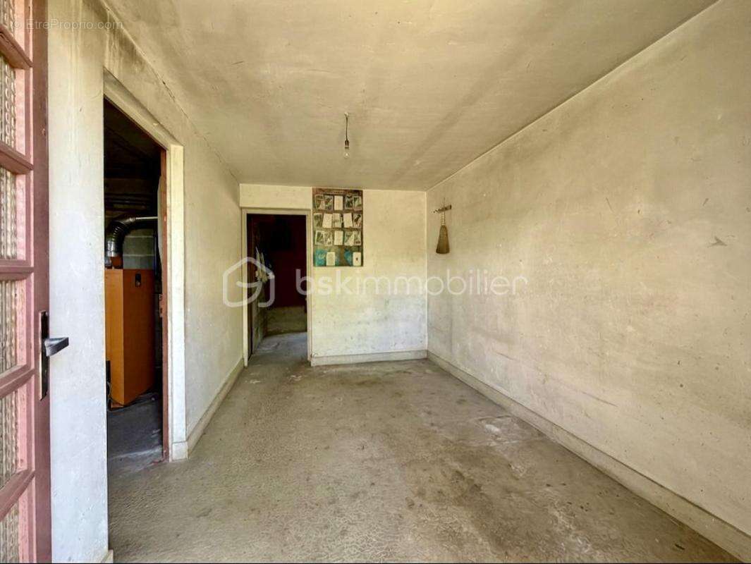 Maison élevée sur sous-sol de 152 m² - photo 7