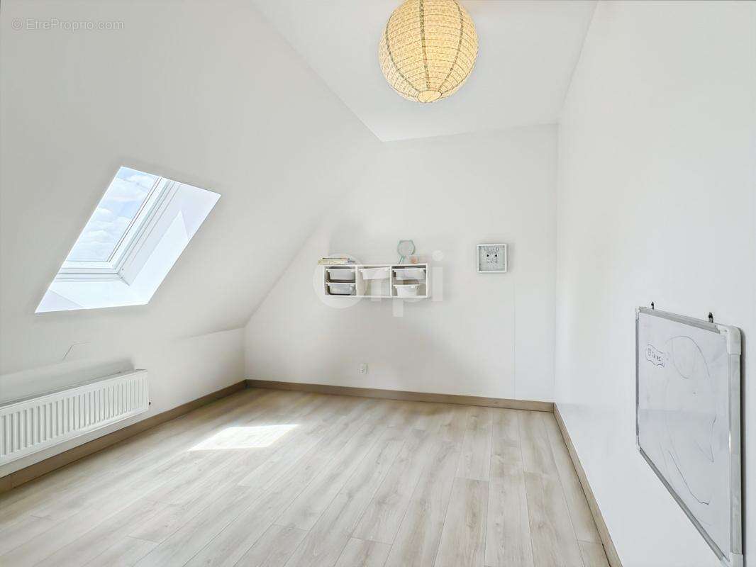 Maison 6 pièces de 117 m² - photo 17