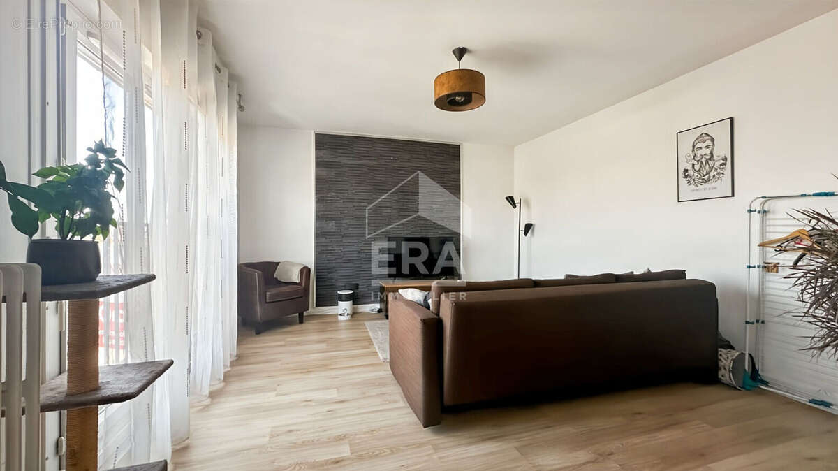 Appartement Reims 2 pièce(s) 54m2 - photo 2